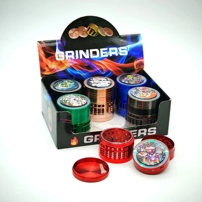 PLGSKT1 GRINDER METAL SKULL TATTO W/LED LIGHT + CHARGER 63MM 4PT ASST DESIGNS